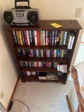 Book shelf with books and Phillips radio/cd player