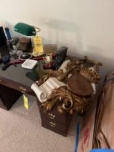 Miscellaneous contents on computer desk and small trash cans