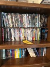 3 shelves of dvds