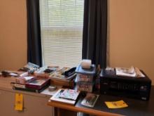 large assortment of office supplies, printer, rubber bands, calculator, misc