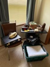 chair , display stand, electronics, briefcase, misc