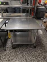 Stainless steel prep table on casters, 3ft long