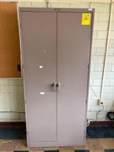 Metal 2 door cabinet, room 1509