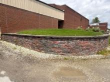 90 plus feet of retaining wall pavers - behind school