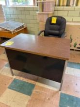 Small teachers desk with two drawers and chair - Rm 1104