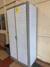 metal storage cabinet - Rm 1121