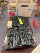 Assorted keyboards, power supplies, mice, chrome boxes