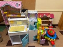 Kids toys including doll houses, baby changing station, garden center, racetrack - Rm 1112
