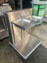 Stainless steel Piper brand cantilever double tray dispenser - outside gym