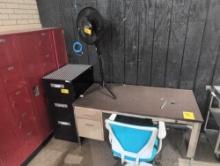 Metal desk, fan, file cabinet and chair, room 2105