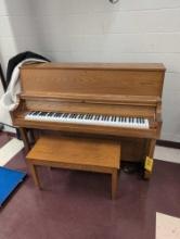 Yamaha piano with oak case, room 1202