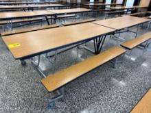 Folding cafeteria lunch table on casters