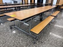 Folding cafeteria lunch table on casters