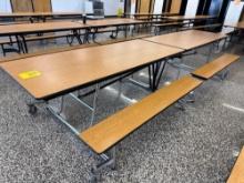 Folding cafeteria lunch table on casters