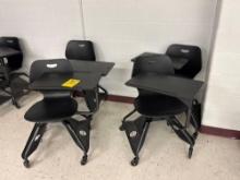 4 adjustable desks on wheels - room 1201
