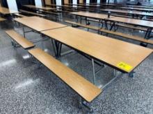 Folding cafeteria lunch table on casters