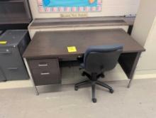 Metal teachers desk with chair, room 1304