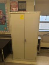 Metal 2 door cabinet , room 1304