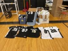large lot of used football jerseys, pants, rib pads - Bell Harron