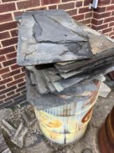 2 piles of assorted pieces of slate - outside maintenance garage