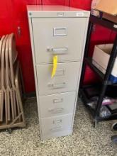 Nice 4 drawer file cabinet - outside maintenance garage hallway