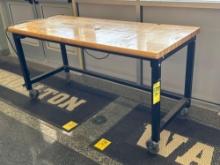 bench 6ft table on wheels with power strips on - maintance garage