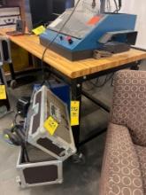 6 ft work bench on wheels with power strips on - maintance garage