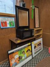 Bookcase, microwave, posters and mirror , room 1401