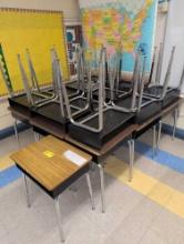 23 student desks and 29 chairs, room 2406