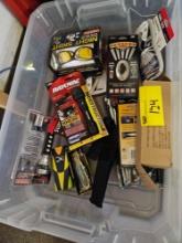 Tote of new items, knives, flashlights, etc