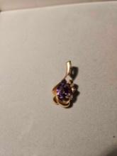 14k yellow gold pendant/earring with purple stone