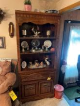 Cabinet with Decorative Plates and Figurines