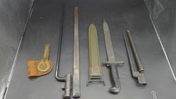 Lot of (3) US Military bayonets and scabbards