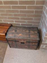 Antique hump back trunk with insert