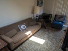 Vintage blue arm chair and brown sofa