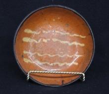 7 in. Redware Plate with Yellow Slip Decoration