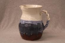 Distinctive handmade stoneware pitcher by Fred Beane