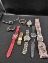 Group of assorted vintage and designer wrist watches