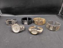 Group of assorted designer wrist watches