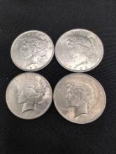 (4) Higher Grade Peace Silver Dollars
