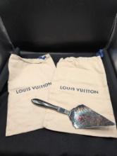 Louis Vuitton dust bags and silver plate cake server