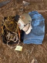 welding helmet, rope, tarp