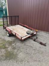 5'x8' single axle utility trailer.
