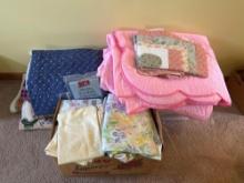 Large lot of sheets, quilts and blankets