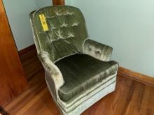 green upholstered swivel rocker