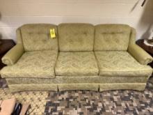 Green Sofa, located in the basement *bring enough help to remove from basement