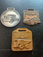 (3) Vintage Watch Fobs - Wasco Haulpak, Diamond Reo Trucks, & Caterpillar Machinery