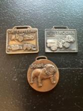(3) Vintage Watch Fobs - Caterpillar Machinery, Mack Bulldog, & Eaton Yale & Towne Trojan