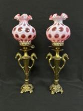 Cranberry Opalescent Coin Dot Shades on Brass Horse Head Lamp Bases