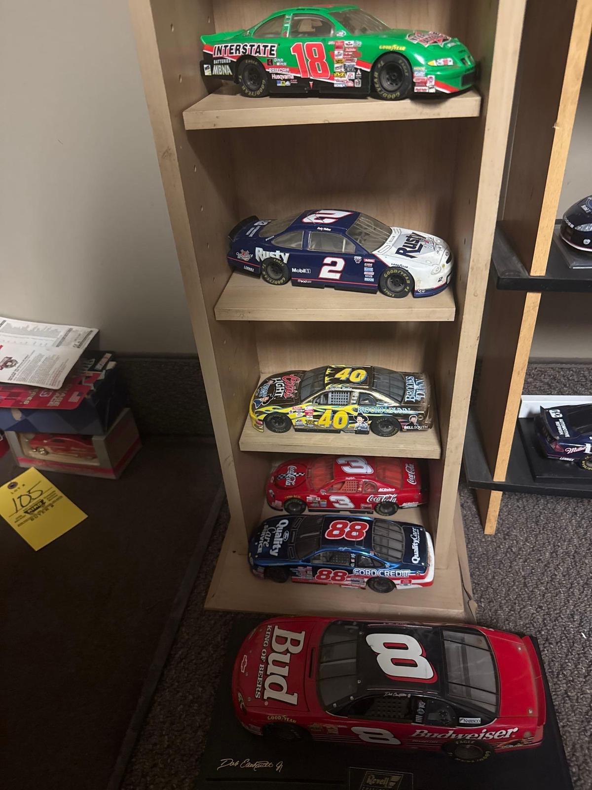 11 assorted die cast cars